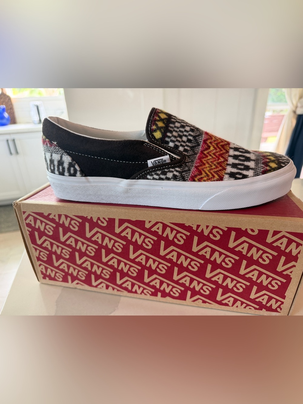 Vans women’s/men’s Slip-On Black with Multicolor Patterned Upper
